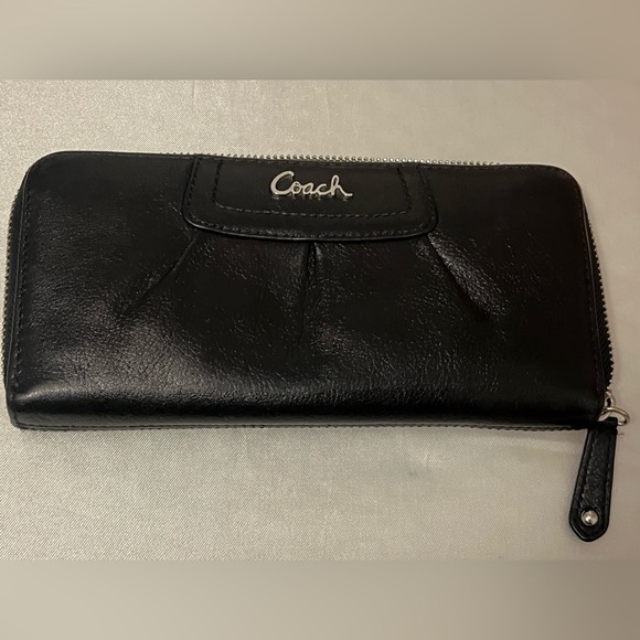 Authentic Coach Black Leather Accordion Wallet with a rich purple fabric lining. - Picture 1 of 6